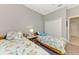 Comfortable bedroom with twin beds, featuring bright decor at 167 Wandering Wetlands Cir, Bradenton, FL 34212