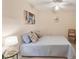 Comfortable bedroom featuring neutral colors and a ceiling fan, perfect for unwinding and relaxing at 1679 Arlington St, Sarasota, FL 34239