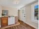 Kitchenette with wood cabinets, tiled countertop, and compact appliances at 1679 Arlington St, Sarasota, FL 34239