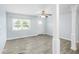 Bright living room showcasing an open floor plan, tiled floors, and neutral paint at 1827 Nevada Ne Ave, St Petersburg, FL 33703