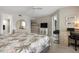 Light and airy bedroom offers spacious layout, desk, and large mirror at 1900 Cove Ii Pl # 133, Sarasota, FL 34242