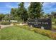 Beautifully landscaped entrance to the Bay Isles Beach Club at 1930 Harbourside Dr # 142, Longboat Key, FL 34228