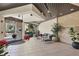 Elegant building lobby with neutral tones, comfortable seating, and tiled flooring at 1930 Harbourside Dr # 142, Longboat Key, FL 34228