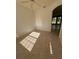 Bedroom featuring tile floors, ceiling fan, and views into the backyard at 2097 Wasatch Dr, Sarasota, FL 34235