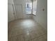 A bright bedroom features neutral walls, large windows, and tile floors at 2097 Wasatch Dr, Sarasota, FL 34235