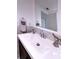 Bathroom featuring a modern vanity with decorative whale accents and ample counter space at 240 Pocono E Trl, Nokomis, FL 34275