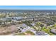 Gorgeous aerial view of the community highlighting lush landscaping, nearby waterways, and tranquil surroundings at 240 Spaniards Rd, Placida, FL 33946