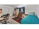 Bedroom is filled with furniture, storage boxes, and other personal items at 240 Spaniards Rd, Placida, FL 33946