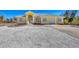 Charming yellow home boasting beautiful landscaping, a well-manicured lawn, and a welcoming entrance at 240 Spaniards Rd, Placida, FL 33946