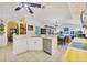 Open kitchen view featuring a stainless dishwasher and an eat-in countertop at 240 Spaniards Rd, Placida, FL 33946