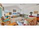 Cozy living room with nice furniture, natural light and a television at 240 Spaniards Rd, Placida, FL 33946