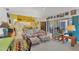 Open-concept living room and kitchen featuring a couch and access to the lanai at 240 Spaniards Rd, Placida, FL 33946