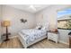 A cozy bedroom featuring a decorative bedspread and accents at 391 Snapdragon Loop, Bradenton, FL 34212