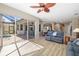 Open living space with a view of the pool and patio at 391 Snapdragon Loop, Bradenton, FL 34212
