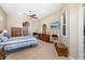 Spacious main bedroom with a ceiling fan and an abundance of natural light at 391 Snapdragon Loop, Bradenton, FL 34212
