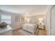 Bright bedroom with coastal decor, ceiling fan, and a window for plenty of natural light at 420 Beach Rd # 502, Sarasota, FL 34242