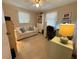 Bright bedroom featuring neutral colored furnishings and décor at 452 N Jefferson Ave # 117, Sarasota, FL 34237