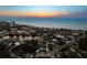 Panoramic aerial view of the coastal community near a tranquil bay at sunset at 4646 Gleason Ave, Sarasota, FL 34242