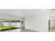 Bright and spacious room featuring sliding glass doors to the backyard at 4646 Gleason Ave, Sarasota, FL 34242