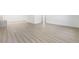 Spacious room highlighting the updated flooring and freshly painted neutral walls at 4646 Gleason Ave, Sarasota, FL 34242