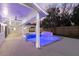Outdoor pool and patio featuring recessed lighting and ample space for entertaining under a covered area at 4646 Gleason Ave, Sarasota, FL 34242