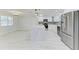 Modern kitchen with stainless steel appliances, a large island, and ample counter space at 502 69Th St, Holmes Beach, FL 34217