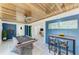 Stylish recreation room with a pool table, bar area, and direct access to the living space at 502 69Th St, Holmes Beach, FL 34217