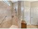 Spacious bathroom with walk-in shower, and convenient accessibility features at 5562 Rain Lily Ct, Sarasota, FL 34238