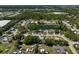 Aerial shot of the neighborhood featuring a central pond surrounded by well-maintained homes, showcasing community living at 5611 22Nd E St, Bradenton, FL 34203