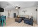 Cozy living room with plush seating, stylish decor, natural light, and hardwood flooring throughout at 5611 22Nd E St, Bradenton, FL 34203