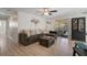 Inviting living room with access to a screened patio and stylish furnishings at 5611 22Nd E St, Bradenton, FL 34203