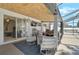 Covered patio with ample seating and view of the backyard pool at 5611 22Nd E St, Bradenton, FL 34203