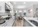 Well-appointed kitchen with stainless steel appliances and a breakfast nook with views of the outdoors at 5954 Anise Dr, Sarasota, FL 34238