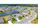Beautiful aerial view of the home with solar panels, overlooking the water, and a well manicured landscape at 6105 114Th E Dr, Parrish, FL 34219