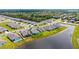 Beautiful light blue home with solar panels and pond view in The Retreat at Willow Bend at 6105 114Th E Dr, Parrish, FL 34219