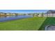 Spacious backyard with a serene pond view at 6105 114Th E Dr, Parrish, FL 34219