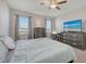 Serene bedroom with large windows, neutral tones, and carpeted floors at 6105 114Th E Dr, Parrish, FL 34219