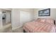 Bedroom featuring a large closet and a picturesque tropical print wall art at 6105 114Th E Dr, Parrish, FL 34219