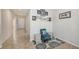 Bright hallway featuring stylish decor, tile flooring, and inviting ambiance at 6105 114Th E Dr, Parrish, FL 34219