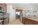 Modern kitchen with stainless steel appliances, granite countertops, and ample cabinet storage at 6105 114Th E Dr, Parrish, FL 34219