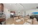 Open concept featuring dining area that connects kitchen and living room in a comfortable and bright space at 6105 114Th E Dr, Parrish, FL 34219