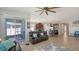 Open-concept living area seamlessly connects to the kitchen, offering a spacious and bright living space at 6105 114Th E Dr, Parrish, FL 34219