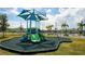 Community playground with covered seating and green turf at The Retreat at Willow Bend at 6105 114Th E Dr, Parrish, FL 34219