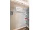 Organized closet space with shelving, hanging rods, a laundry basket, and neatly arranged towels and clothes at 700 Golden Beach Blvd # 222, Venice, FL 34285