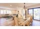 Open living and dining area with modern decor and lots of natural light at 700 Golden Beach Blvd # 222, Venice, FL 34285