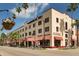 Beautiful street view of the Historic KMI Building, The Venice Shopping Mall with palm trees at 700 Golden Beach Blvd # 222, Venice, FL 34285