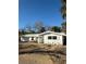 Single-story home with a white exterior, a low-pitched roof, and a front yard at 782 Birdsong Ln, Sarasota, FL 34242