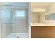 Bright bathroom featuring a glass shower, double sink vanity, and neutral color palette at 10614 Morning Marsh Ln, Parrish, FL 34219