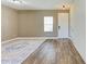 The bright foyer features wood floors, a window, and a door at 10614 Morning Marsh Ln, Parrish, FL 34219