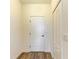 Hallway featuring closet and neutral colored walls at 10614 Morning Marsh Ln, Parrish, FL 34219